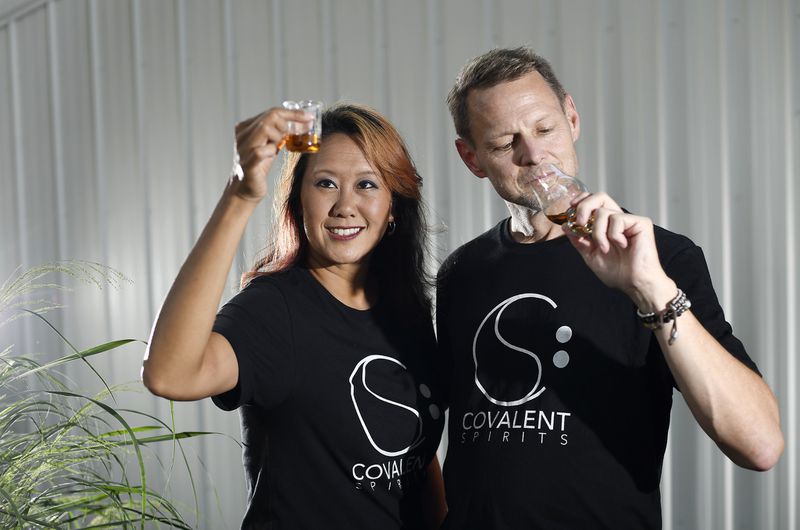 Covalent Spirits owners assessing spirits by sight